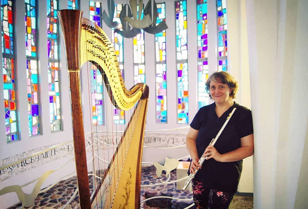 Happy from my favorite flutist and me!! How beautiful do these stained glasses look?!  A treat to play surrounded by so many colours ️